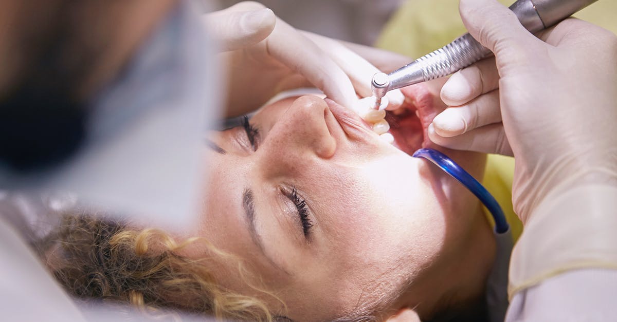 how often is cleaning done in a professional kitchen? - Woman's Teeth Being Clean By Dentist how often is cleaning done in a professional kitchen? - Woman's Teeth Being Clean By Dentist