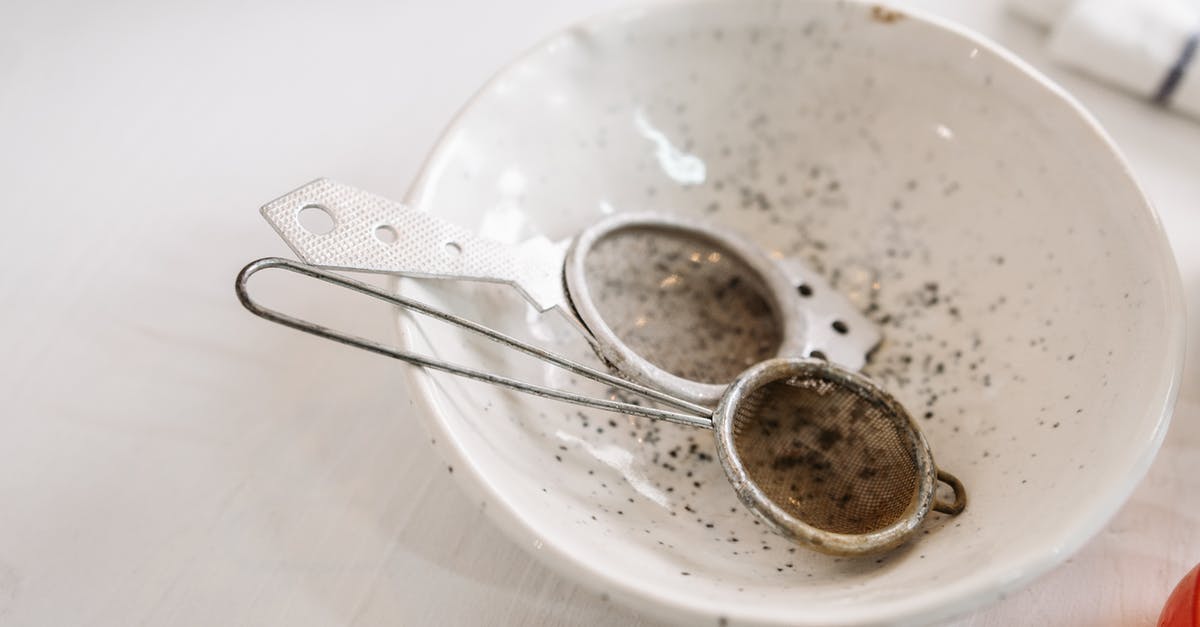 How should baking soda be used to tenderize meat? - Close-Up Shot of Used Baking Utensils