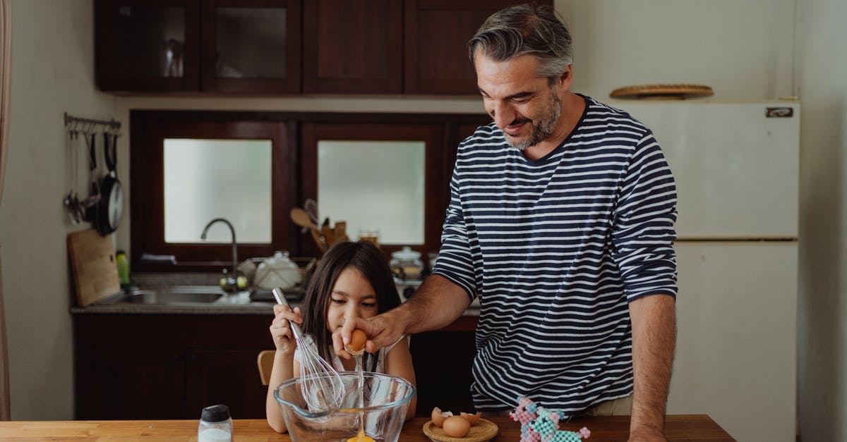 How should I crack an egg? - 
A Father Baking with His Daughter