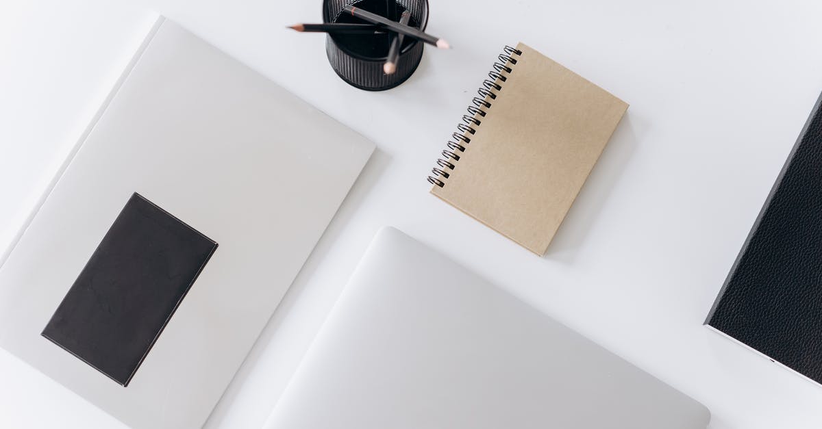 How should I manage my fridge? - Netbook with planner and jotter placed near pencils on desk How should I manage my fridge? - Netbook with planner and jotter placed near pencils on desk