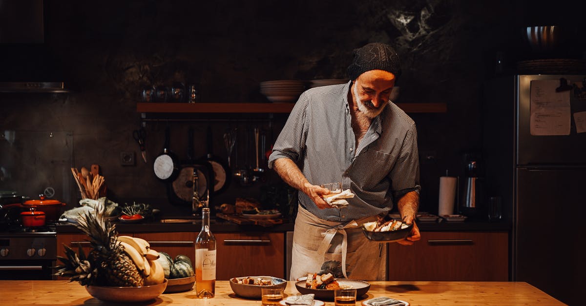How should I order unknown wines in a tasting - Male chef serving dish in kitchen How should I order unknown wines in a tasting - Male chef serving dish in kitchen