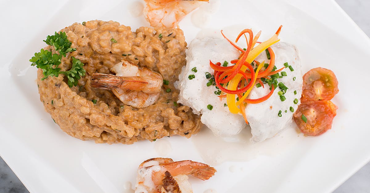 How should I prepare Risotto - Fried Rice With Sliced Tomato and Green Vegetable on White Ceramic Plate How should I prepare Risotto - Fried Rice With Sliced Tomato and Green Vegetable on White Ceramic Plate