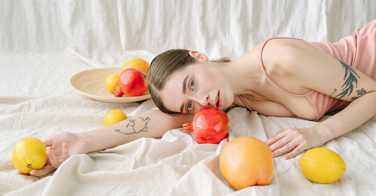How should pomegranates be stored? - A Woman Holding a Lemon While Lying Down How should pomegranates be stored? - A Woman Holding a Lemon While Lying Down