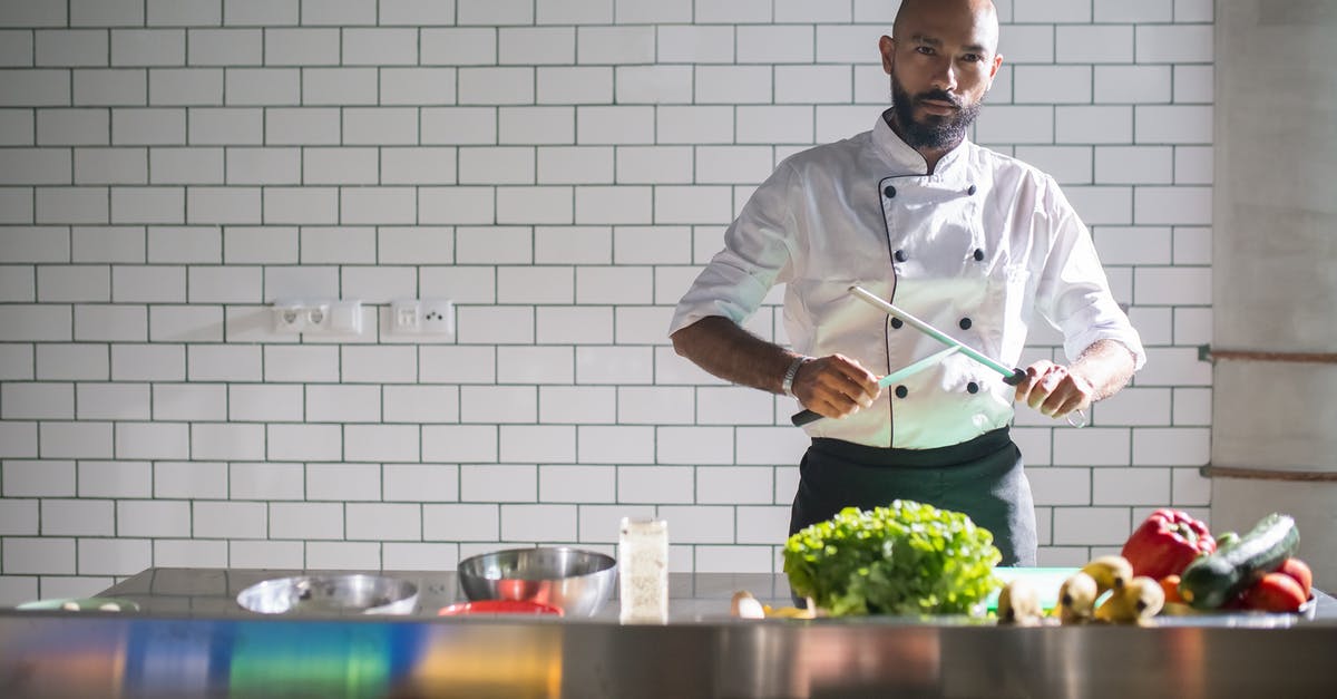 How should swordfish be prepared? - Man in Gray Dress Shirt Holding Chopsticks How should swordfish be prepared? - Man in Gray Dress Shirt Holding Chopsticks