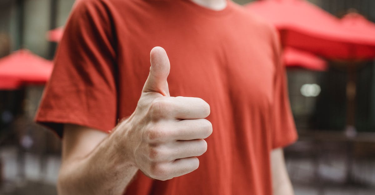 How to achieve a good char on cooked and shredded chicken? - Crop anonymous young male in red t shirt showing thumb up gesture while standing on city street on sunny day How to achieve a good char on cooked and shredded chicken? - Crop anonymous young male in red t shirt showing thumb up gesture while standing on city street on sunny day