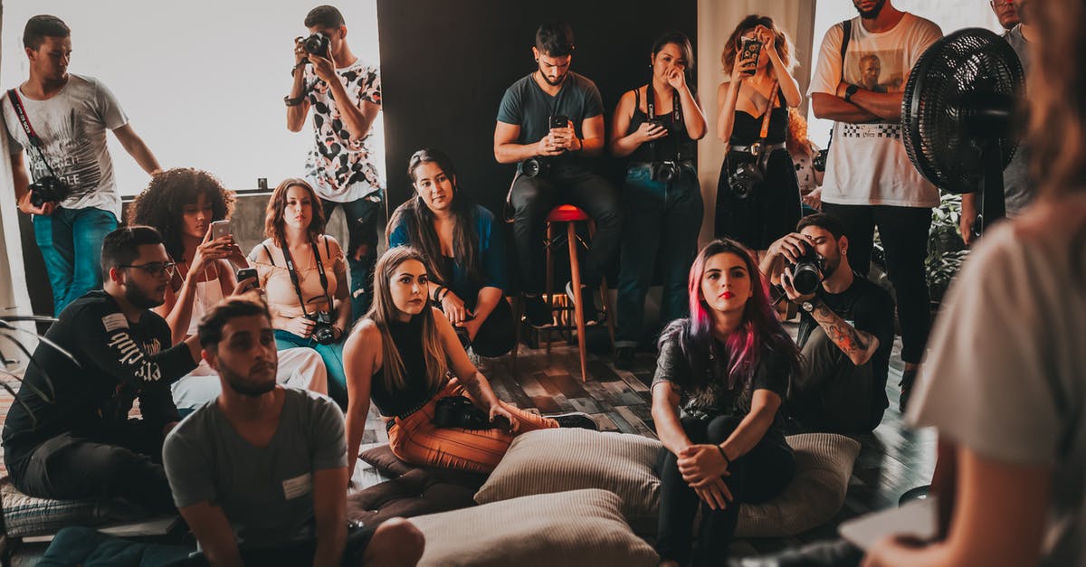 How to assemble a springform pan? - Group of multiethnic young people wearing casual clothes gathering together in spacious studio and listening attentively to female speaker How to assemble a springform pan? - Group of multiethnic young people wearing casual clothes gathering together in spacious studio and listening attentively to female speaker
