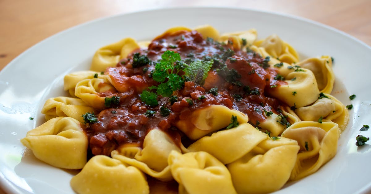 How to avoid cooked pasta soaking up sauce when stored? - Close-Up Photo of Tortellini How to avoid cooked pasta soaking up sauce when stored? - Close-Up Photo of Tortellini