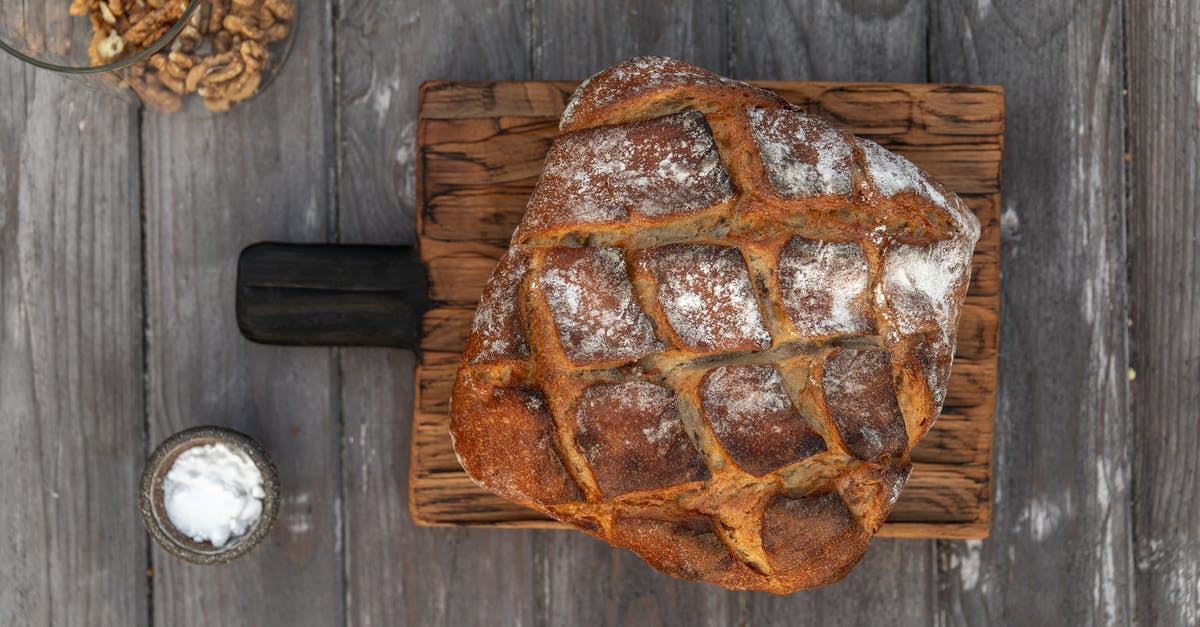How to Avoid Soggy Chopped Nuts in Baked Goods - Brown Bread on Wooden Table How to Avoid Soggy Chopped Nuts in Baked Goods - Brown Bread on Wooden Table