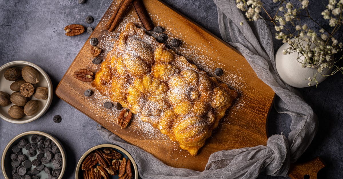 How to Avoid Soggy Chopped Nuts in Baked Goods - Flatlay of a Delicious Bread on Brown Wooden Chopping Board How to Avoid Soggy Chopped Nuts in Baked Goods - Flatlay of a Delicious Bread on Brown Wooden Chopping Board