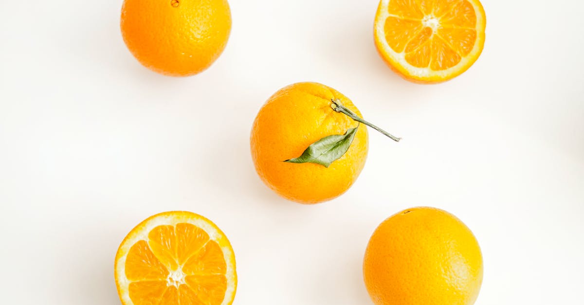 How to avoid the blackening fruits once they are cut? - Oranges on White Surface How to avoid the blackening fruits once they are cut? - Oranges on White Surface