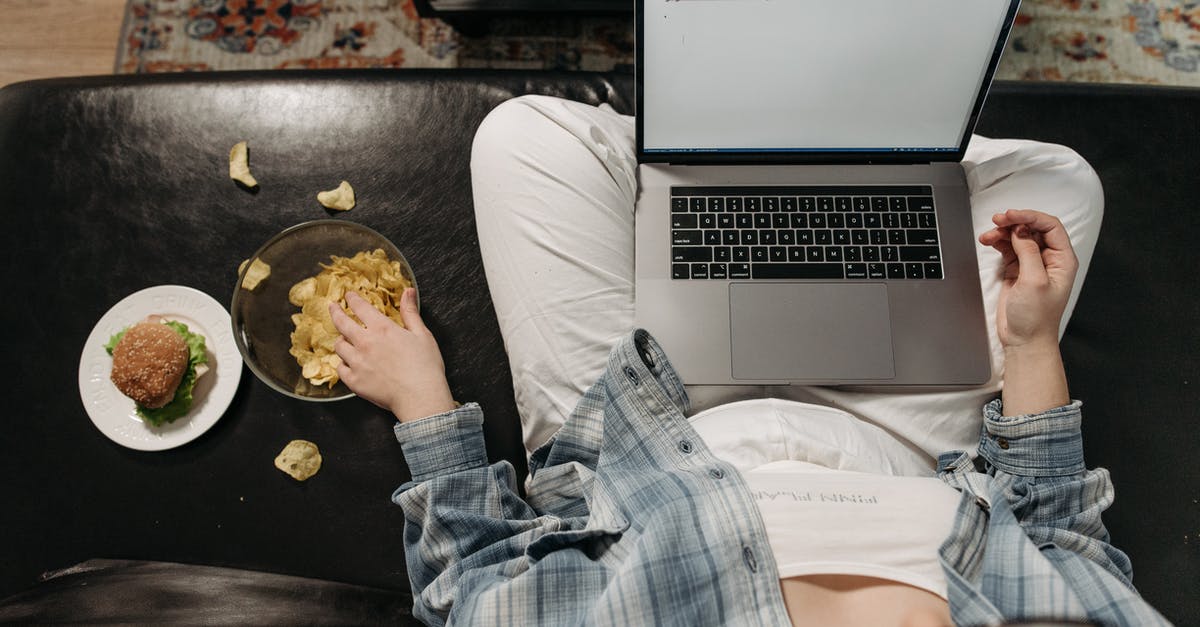 How to bake chips in microwave using grill? - Overhead Shot of a Person Eating Chips while Using a Laptop How to bake chips in microwave using grill? - Overhead Shot of a Person Eating Chips while Using a Laptop