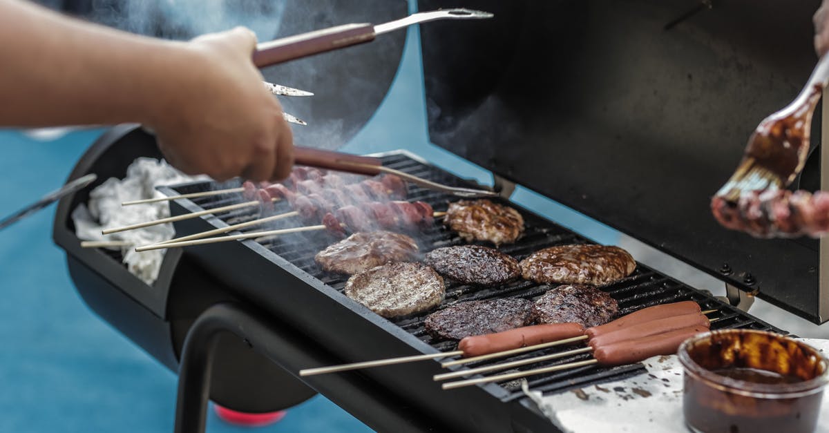 How To BBQ Sausages - Person Grilling Sausage and Meat How To BBQ Sausages - Person Grilling Sausage and Meat