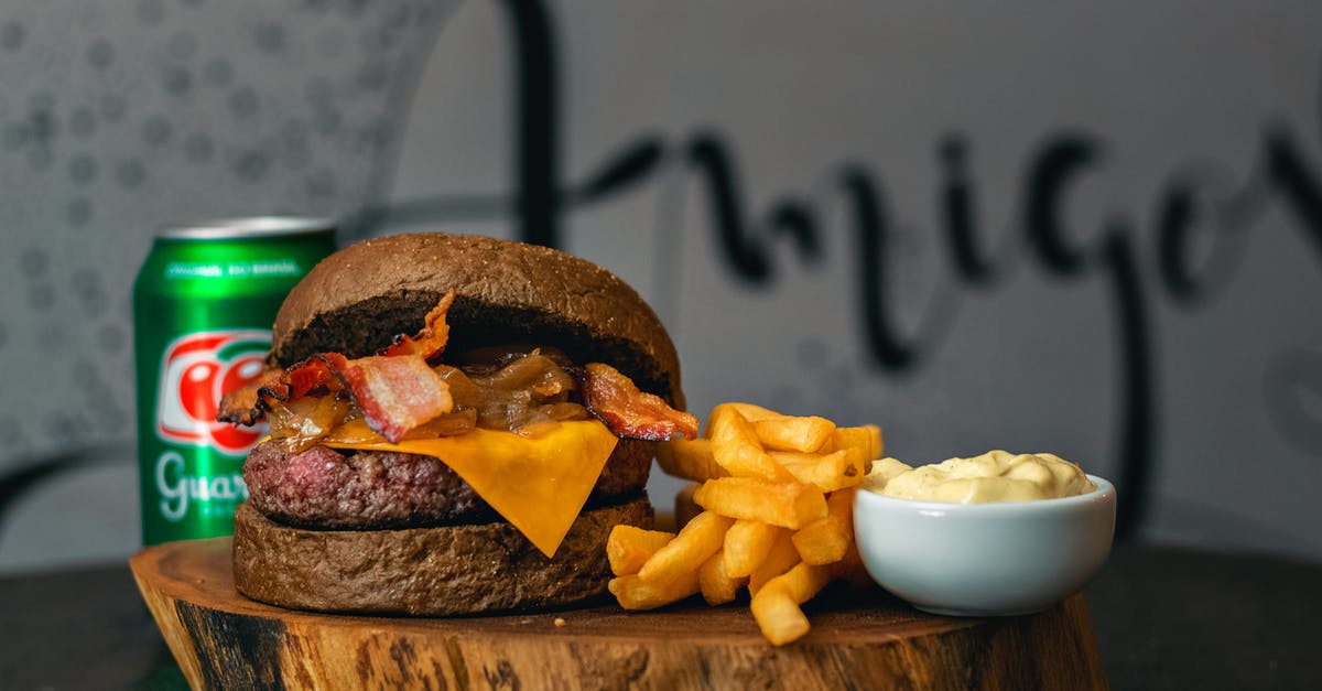 How to bind chopped pepperoni, salami, and bacon - Burger With Fries on Brown Wooden Chopping Board How to bind chopped pepperoni, salami, and bacon - Burger With Fries on Brown Wooden Chopping Board