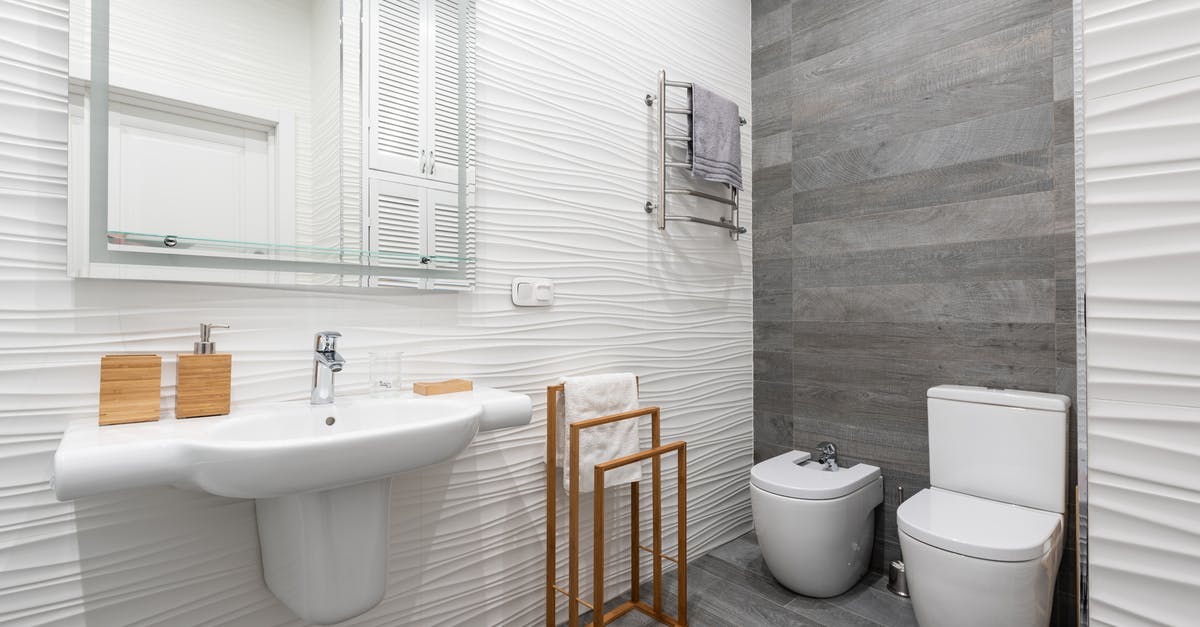 How to broil a rack of goat ribs - Contemporary bathroom interior with washbasin and toilet bowl