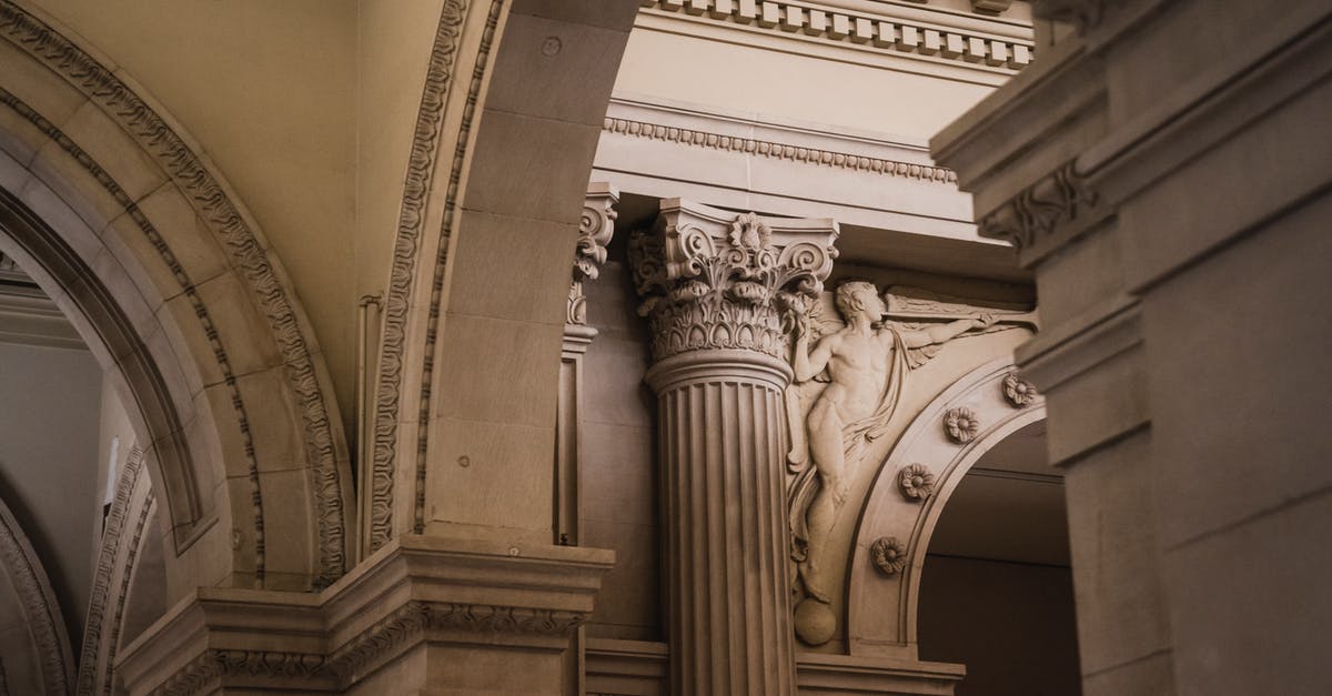 How to carve poultry? - From below of aged stone arch with columns and stucco decorations on wall of ancient building How to carve poultry? - From below of aged stone arch with columns and stucco decorations on wall of ancient building