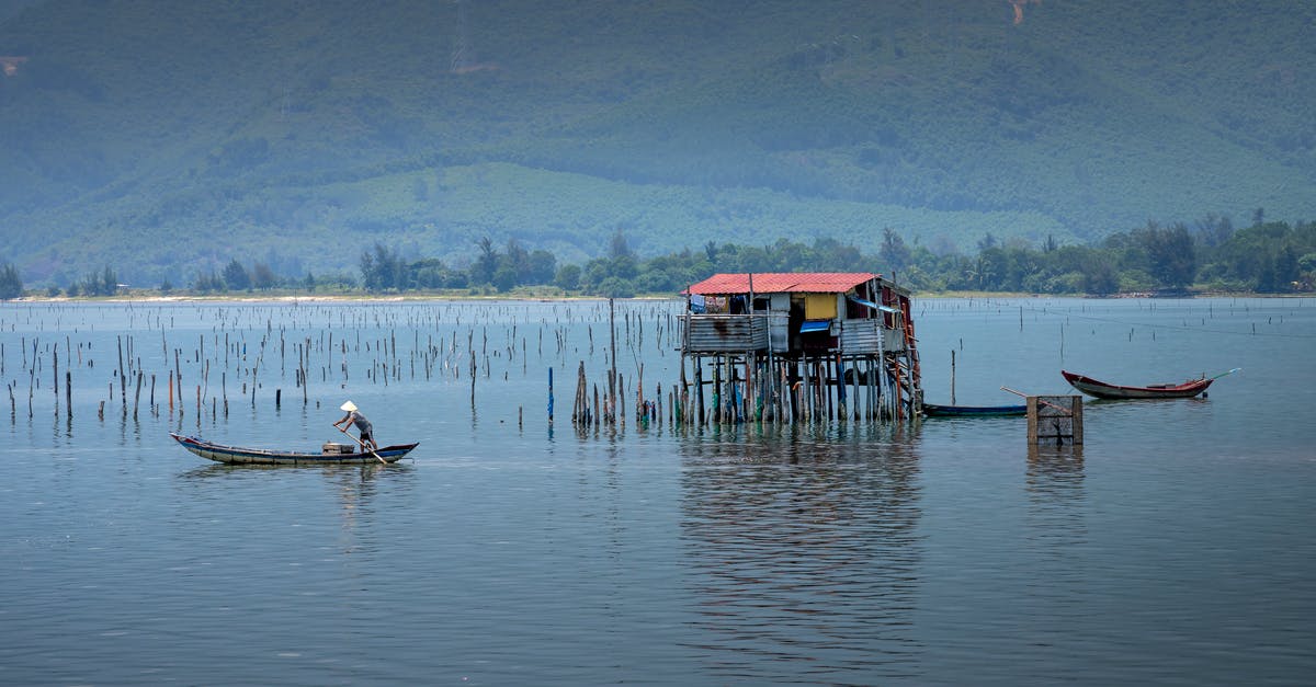 How to catch culture out of yogurt? - Unrecognizable fisherman catching fish in river from boat How to catch culture out of yogurt? - Unrecognizable fisherman catching fish in river from boat
