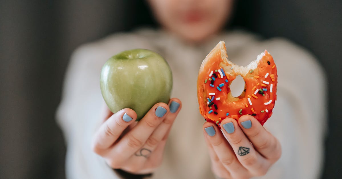 How to choose appropriate drinkware for cocktails? - Woman showing apple and bitten doughnut How to choose appropriate drinkware for cocktails? - Woman showing apple and bitten doughnut