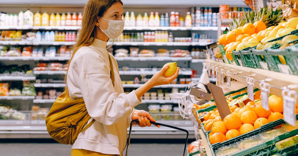 How to choose appropriate drinkware for cocktails? - Woman in Yellow Tshirt and Beige jacket Holding a Fruit Stand How to choose appropriate drinkware for cocktails? - Woman in Yellow Tshirt and Beige jacket Holding a Fruit Stand