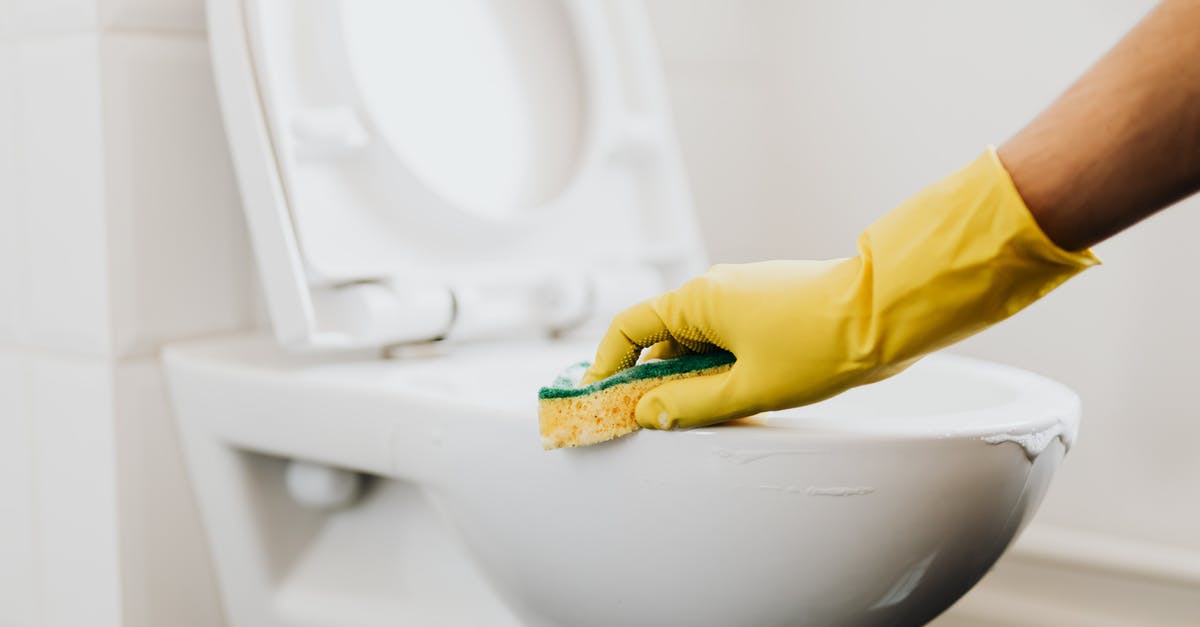 How to clean aluminum with lye "stains" - Crop cleaner in rubber glove wiping toilet rim How to clean aluminum with lye "stains" - Crop cleaner in rubber glove wiping toilet rim