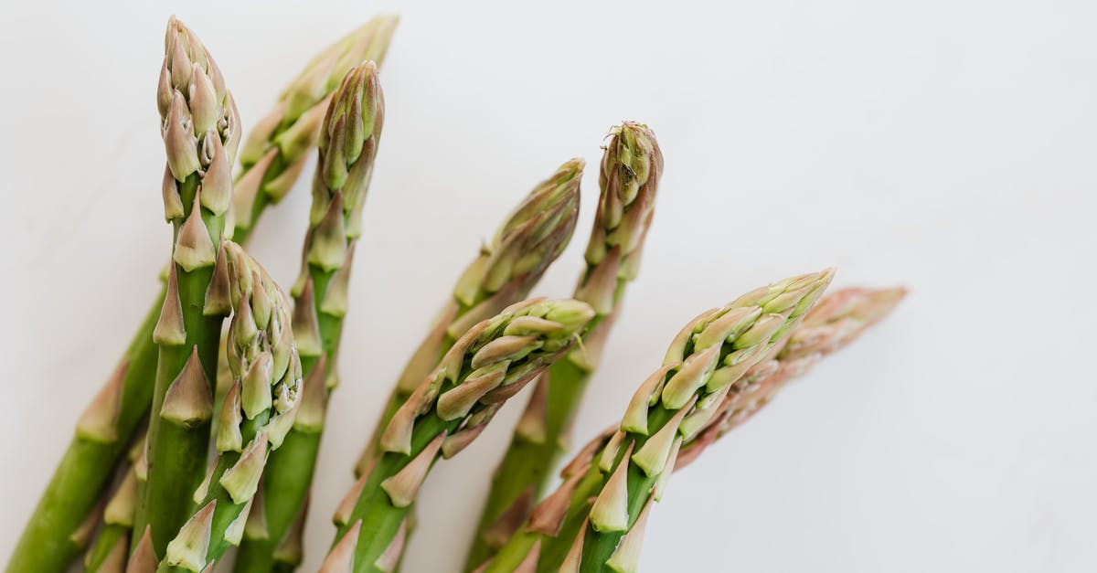 How to clean caked on stains from juicing vegetables? - Ends of asparagus pods in bunch