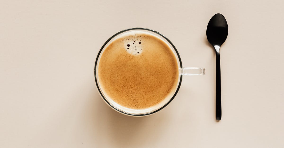 How to correct bitterness in blended homemade salsa? - From above of clear glass cup with hot aromatic drink placed near black metal spoon on beige table for coffee break How to correct bitterness in blended homemade salsa? - From above of clear glass cup with hot aromatic drink placed near black metal spoon on beige table for coffee break