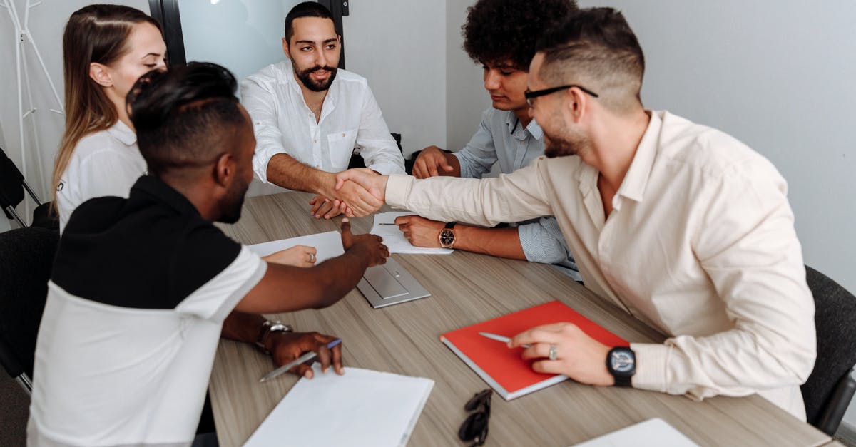 How to deal with strong, sizable spices? - Man in White Dress Shirt Sitting Beside Man in Black Dress Shirt How to deal with strong, sizable spices? - Man in White Dress Shirt Sitting Beside Man in Black Dress Shirt