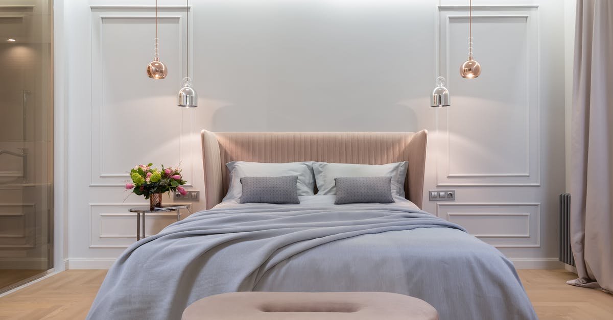 How to decorate extremely fine details - Bedroom interior with bed near table under lamps How to decorate extremely fine details - Bedroom interior with bed near table under lamps