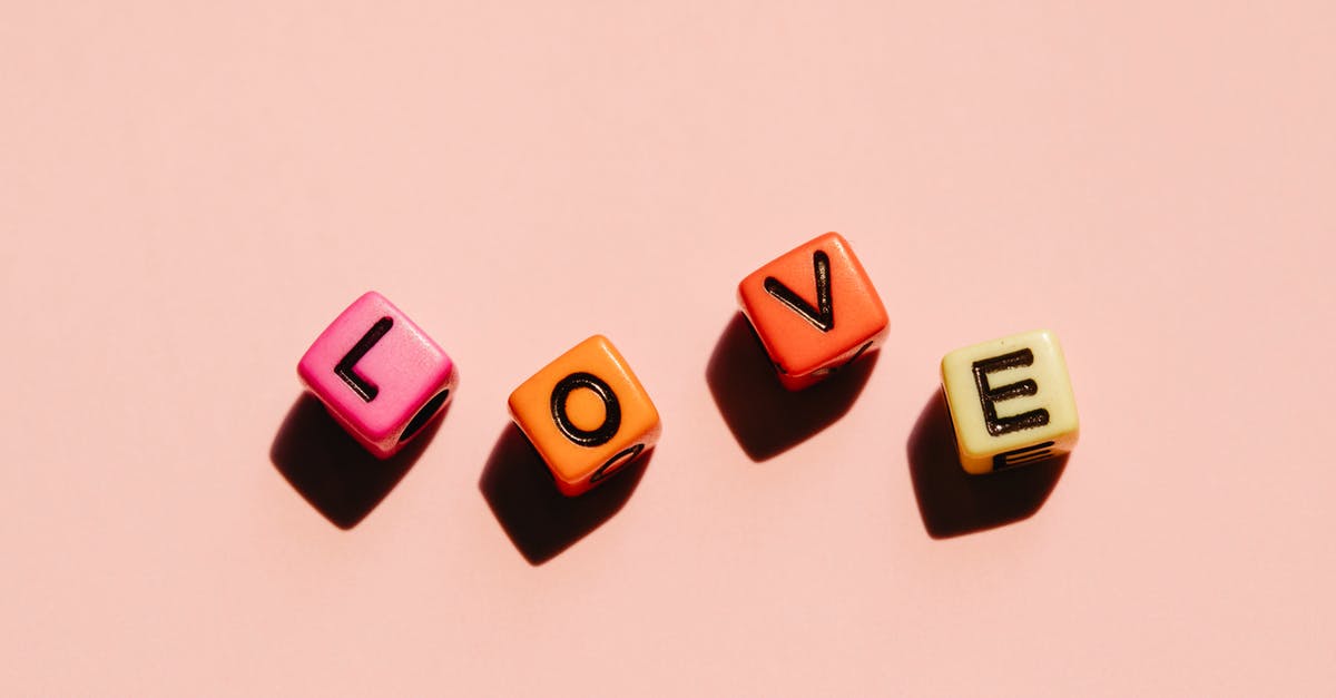How to dice tomatoes? - Colorful dice with Love inscription How to dice tomatoes? - Colorful dice with Love inscription