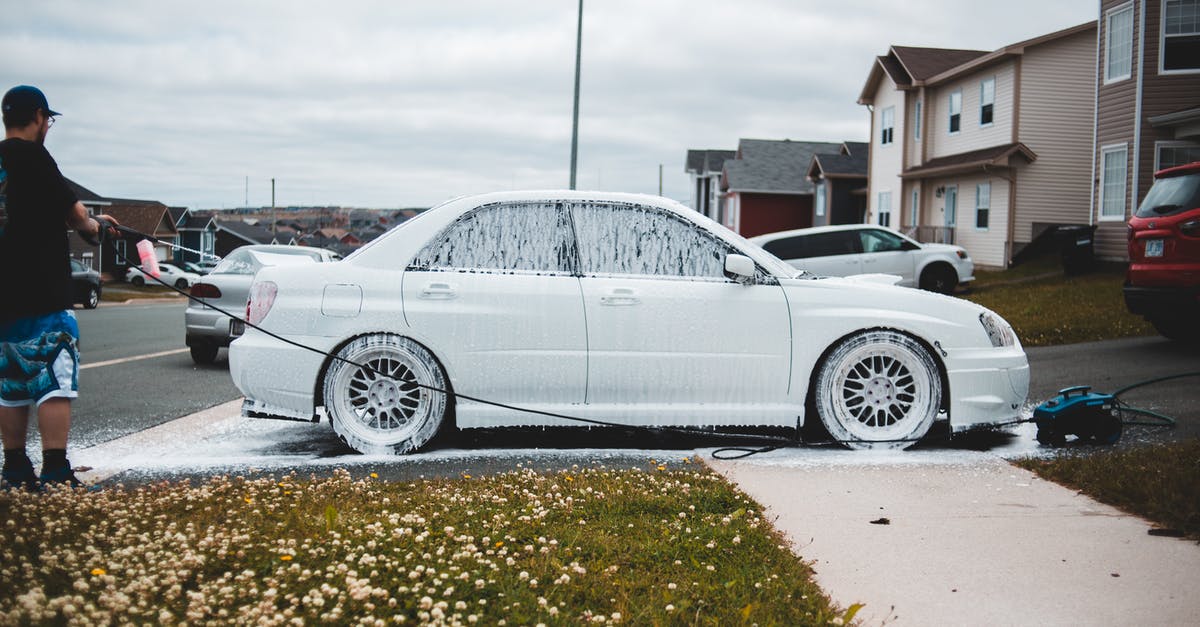 how to disarm a potentially pressurized whipping siphon? - Foamed car on driveway and sidewalk being washed by male driver at daytime how to disarm a potentially pressurized whipping siphon? - Foamed car on driveway and sidewalk being washed by male driver at daytime