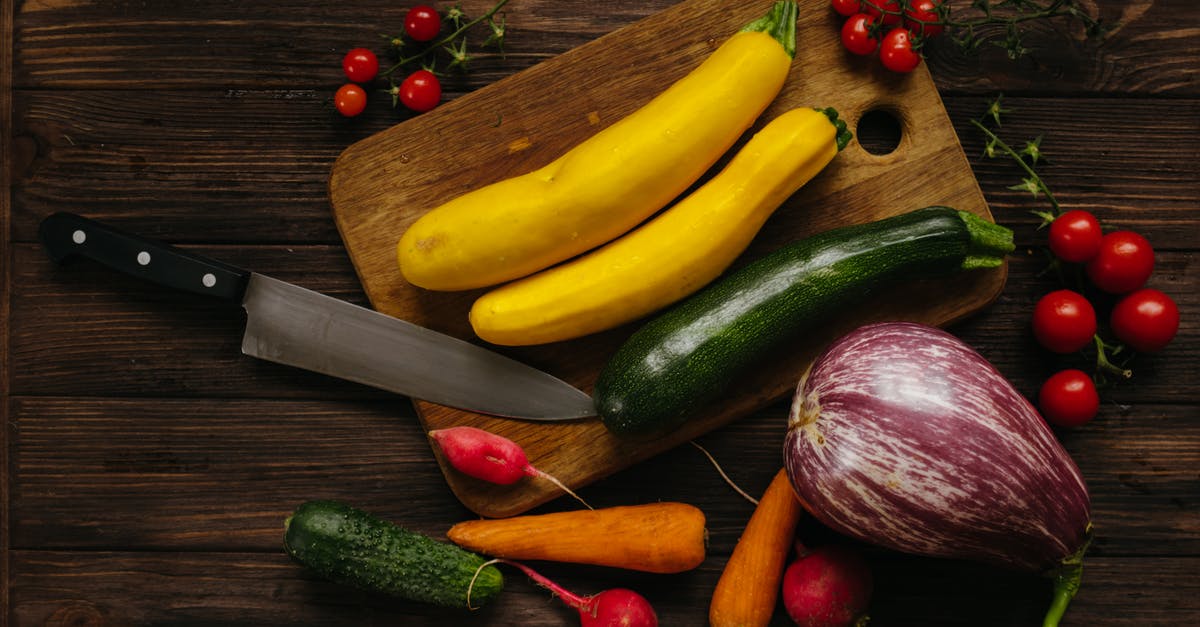 How to drain zucchini and eggplant - Assorted Vegetables on Chopping Board on Wooden Surface How to drain zucchini and eggplant - Assorted Vegetables on Chopping Board on Wooden Surface