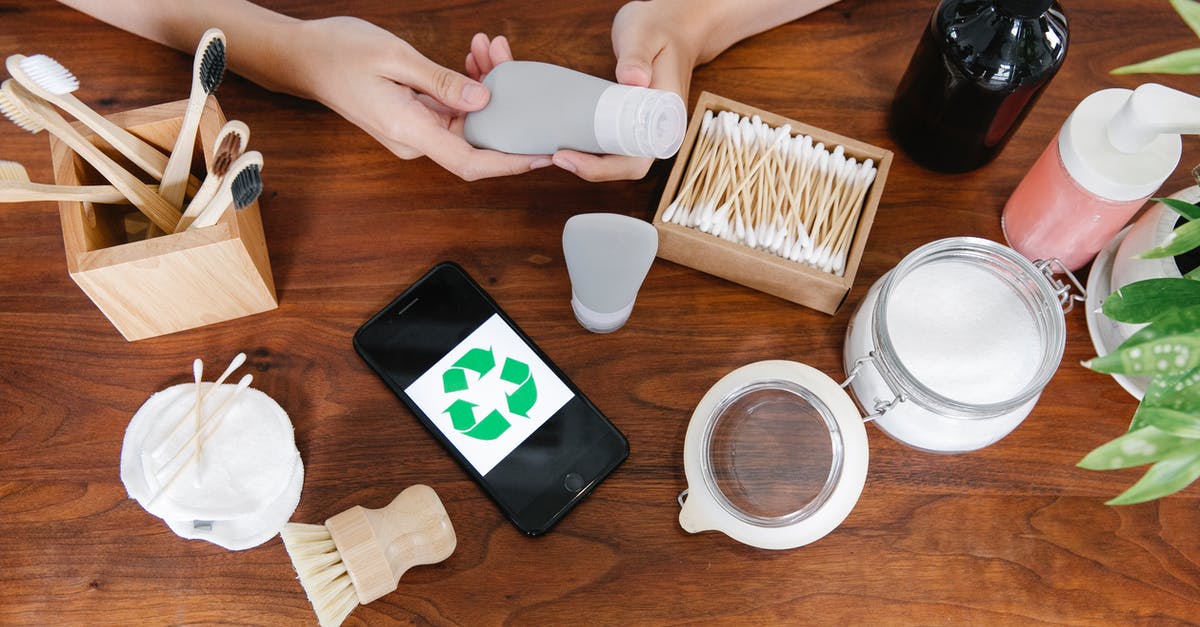 How to effectively take cream from milk? - Crop person taking recycling tube of cosmetics How to effectively take cream from milk? - Crop person taking recycling tube of cosmetics