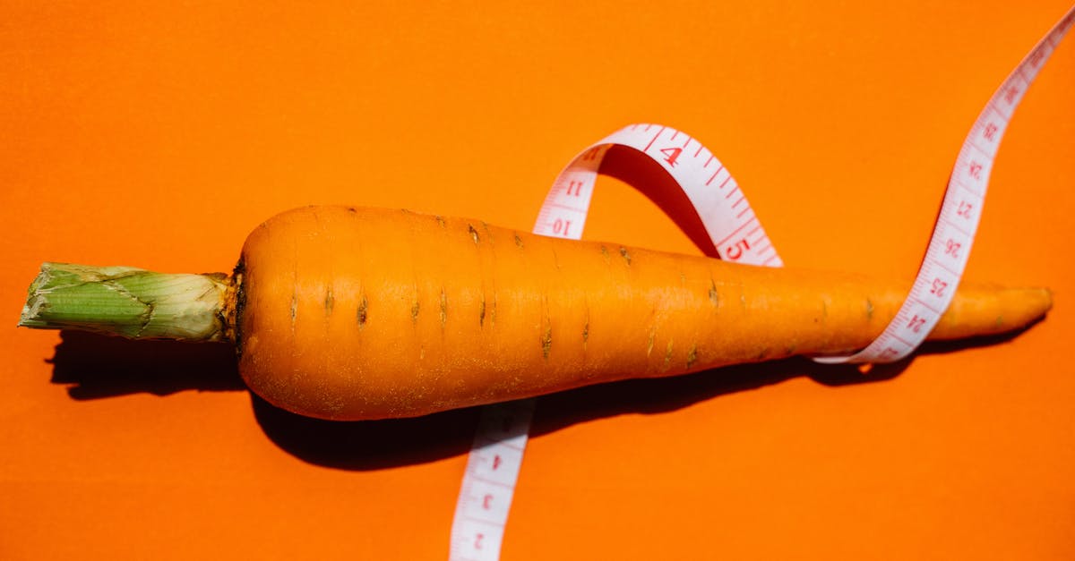 how to ensure carrot pieces stay longer in the refrigerator? - Orange Carrot on Black Table how to ensure carrot pieces stay longer in the refrigerator? - Orange Carrot on Black Table