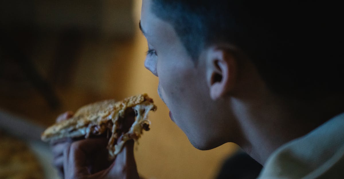 How to evenly portion chapati dough? - Hungry man eating piece of pizza How to evenly portion chapati dough? - Hungry man eating piece of pizza