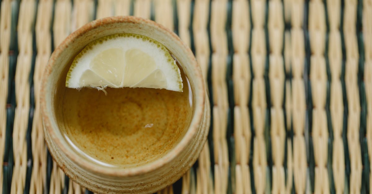 How to Feed a Sour Culture - Oriental cup of green tea on straw mat How to Feed a Sour Culture - Oriental cup of green tea on straw mat