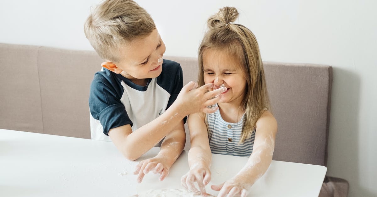 How to find/properly cook fresh Baby Squids? - Girl in Blue Long Sleeve Shirt Sitting Beside Girl in White Shirt How to find/properly cook fresh Baby Squids? - Girl in Blue Long Sleeve Shirt Sitting Beside Girl in White Shirt