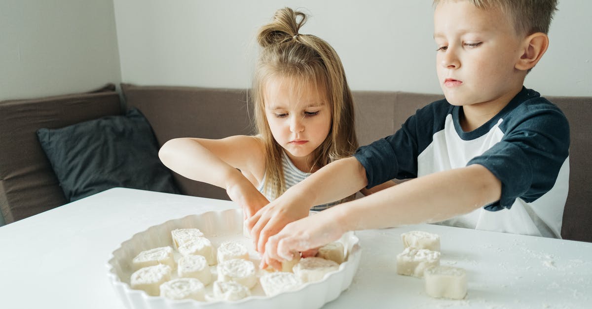 How to find/properly cook fresh Baby Squids? - Girl in Blue and White Shirt Sitting Beside Girl in White Shirt How to find/properly cook fresh Baby Squids? - Girl in Blue and White Shirt Sitting Beside Girl in White Shirt