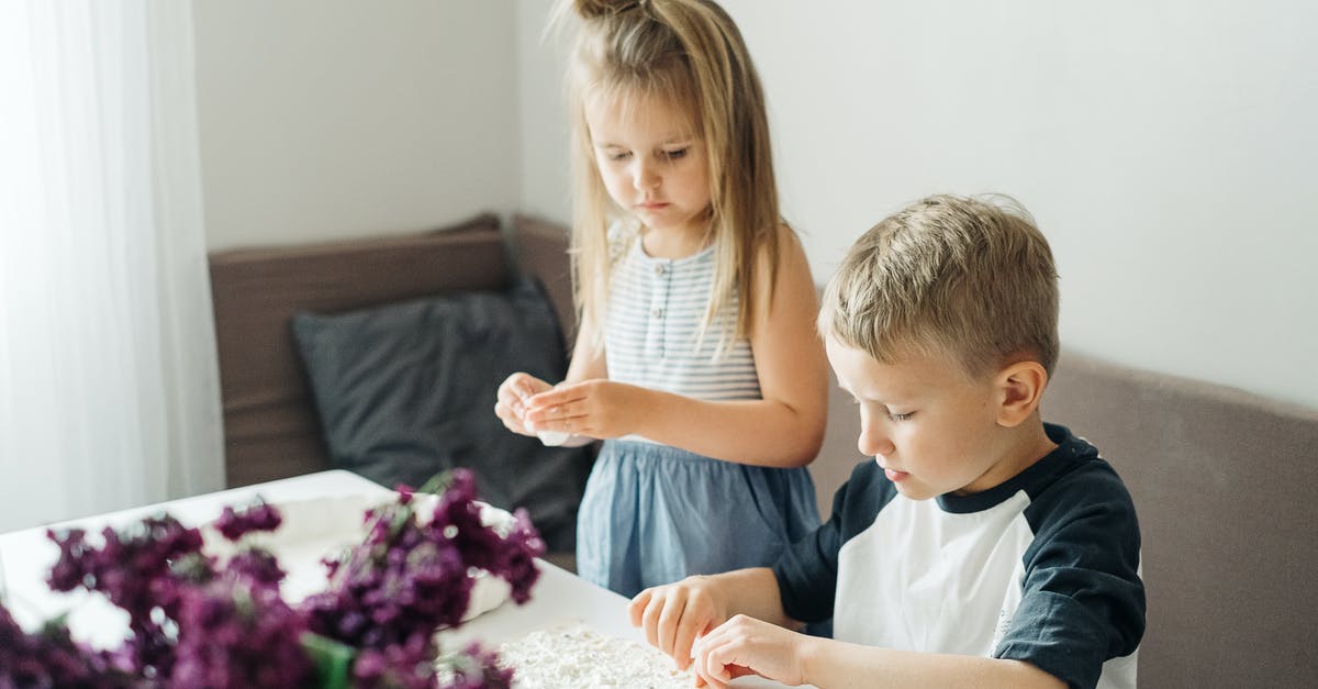 How to find/properly cook fresh Baby Squids? - Girl in Blue Long Sleeve Shirt Sitting Beside Girl in White Shirt How to find/properly cook fresh Baby Squids? - Girl in Blue Long Sleeve Shirt Sitting Beside Girl in White Shirt