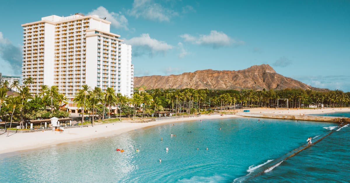 How to flake rock sea salt? - White and Brown Concrete Building Near Body of Water How to flake rock sea salt? - White and Brown Concrete Building Near Body of Water
