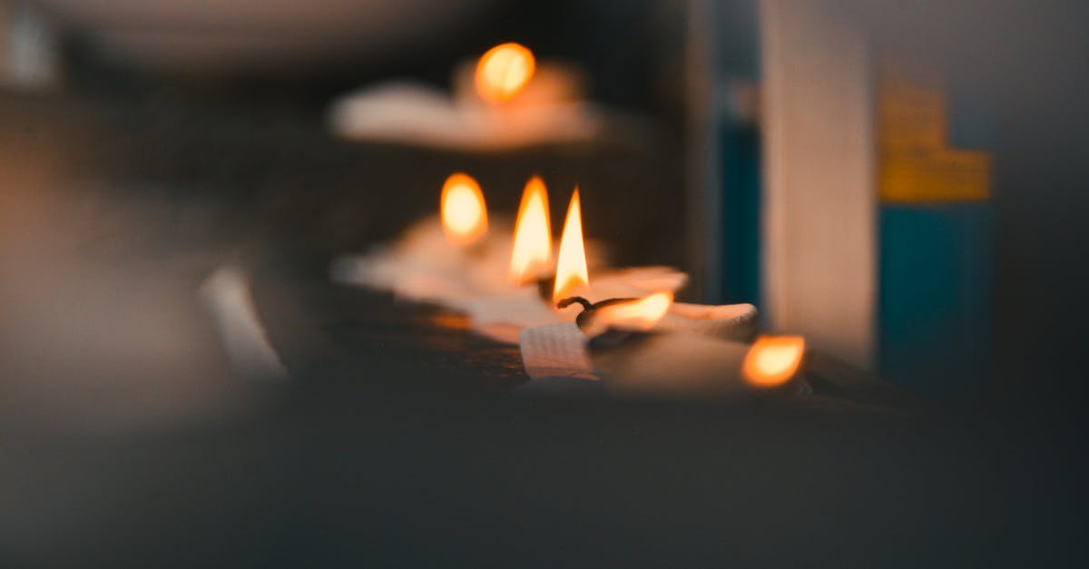 How to fry in a wok without burning oil? - Selective Focus Photography of Lighted Tealights How to fry in a wok without burning oil? - Selective Focus Photography of Lighted Tealights