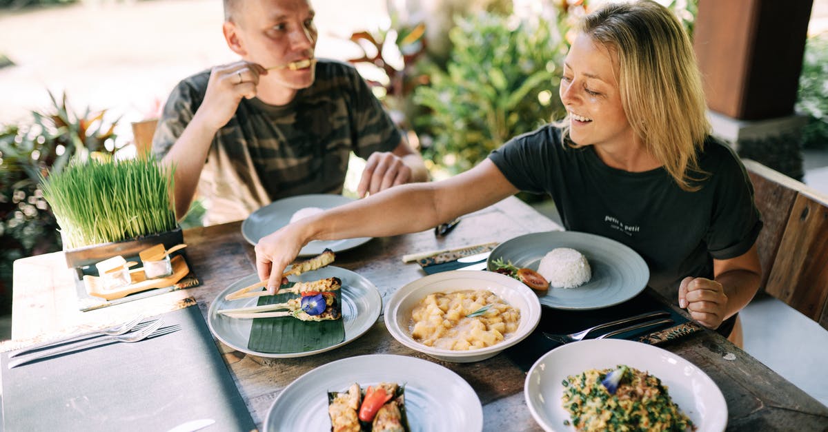 How to get flavours to infuse into rice - Man and Woman Eating Dinner on a Terrace How to get flavours to infuse into rice - Man and Woman Eating Dinner on a Terrace