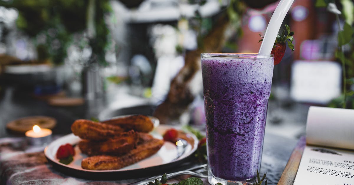 How to get raspberry flavor into a smoothie without seeds? - Delicious churros with fresh strawberries and blueberry smoothie in cafe How to get raspberry flavor into a smoothie without seeds? - Delicious churros with fresh strawberries and blueberry smoothie in cafe