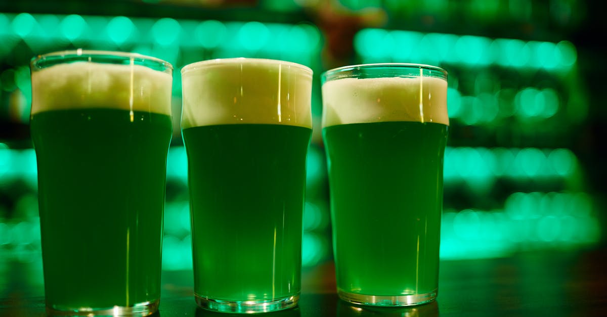 How to get rid of foam on shaken cocktails - 3 Clear Drinking Glasses With Green Beer How to get rid of foam on shaken cocktails - 3 Clear Drinking Glasses With Green Beer