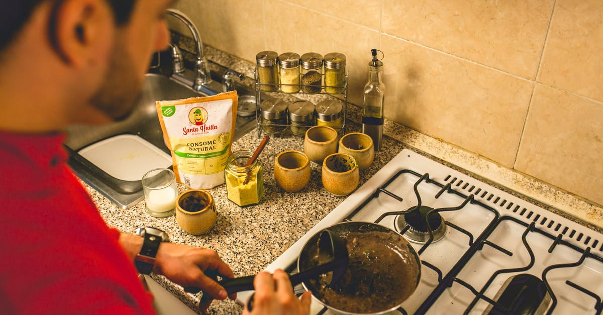 How to get spices off pan - even after washing - High Angle View of Chef Cooking How to get spices off pan - even after washing - High Angle View of Chef Cooking