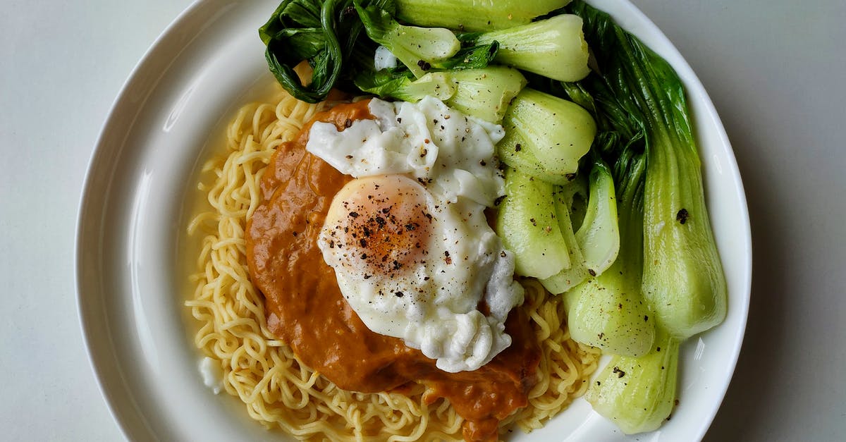 How to get spicey flavour from black peppers in stew? - Delicious noodles with bok choy and fried egg on plate How to get spicey flavour from black peppers in stew? - Delicious noodles with bok choy and fried egg on plate