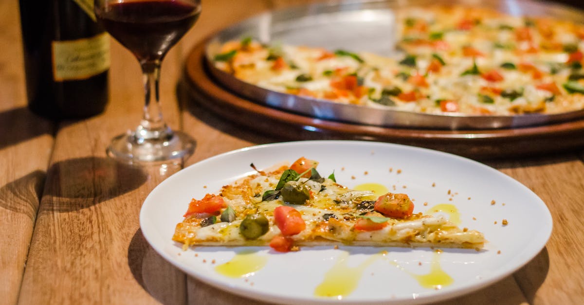How to get vegan cheese to taste like cheese - Pizza on Stainless Steel Tray How to get vegan cheese to taste like cheese - Pizza on Stainless Steel Tray