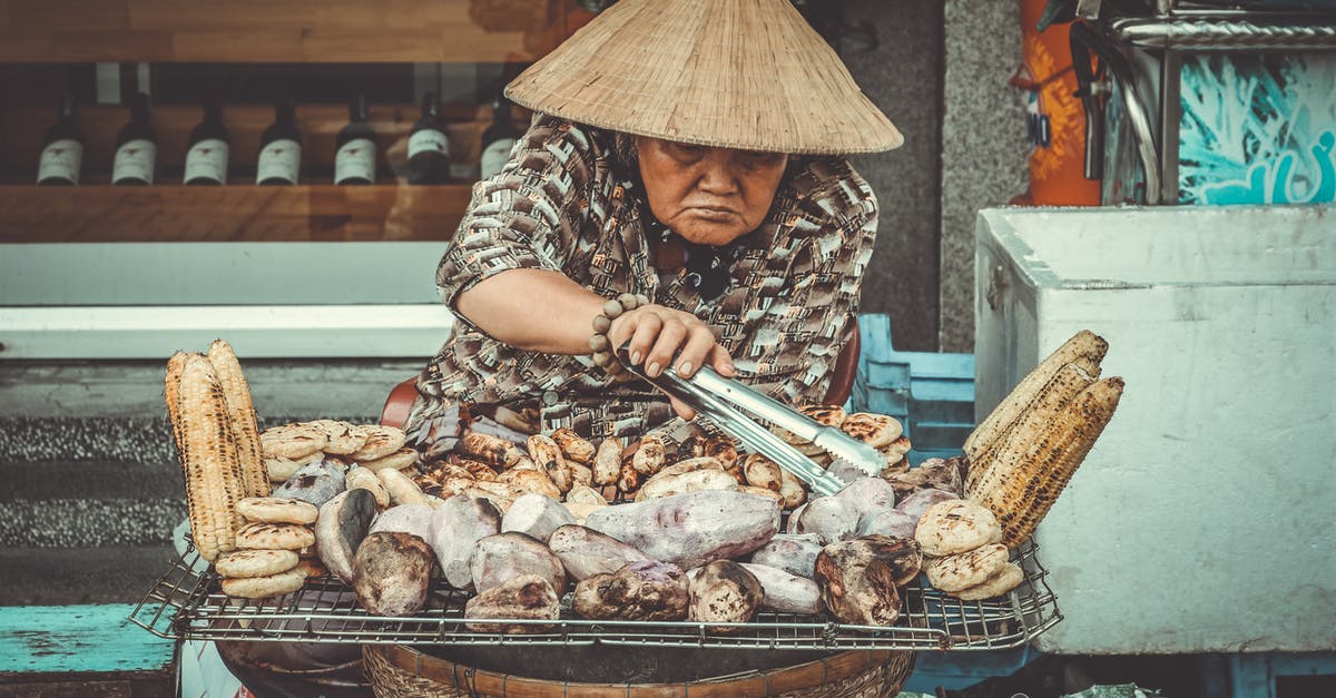 How to grill potatoes? - Woman Selling Grilled Root Crops How to grill potatoes? - Woman Selling Grilled Root Crops