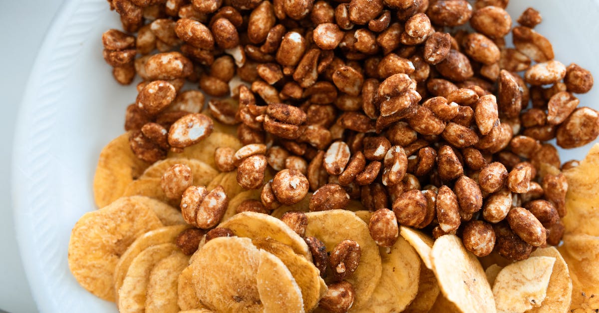 How to honey roast peanuts? - Close-Up Shot of Banana Chips and Honey Roasted Peanuts How to honey roast peanuts? - Close-Up Shot of Banana Chips and Honey Roasted Peanuts