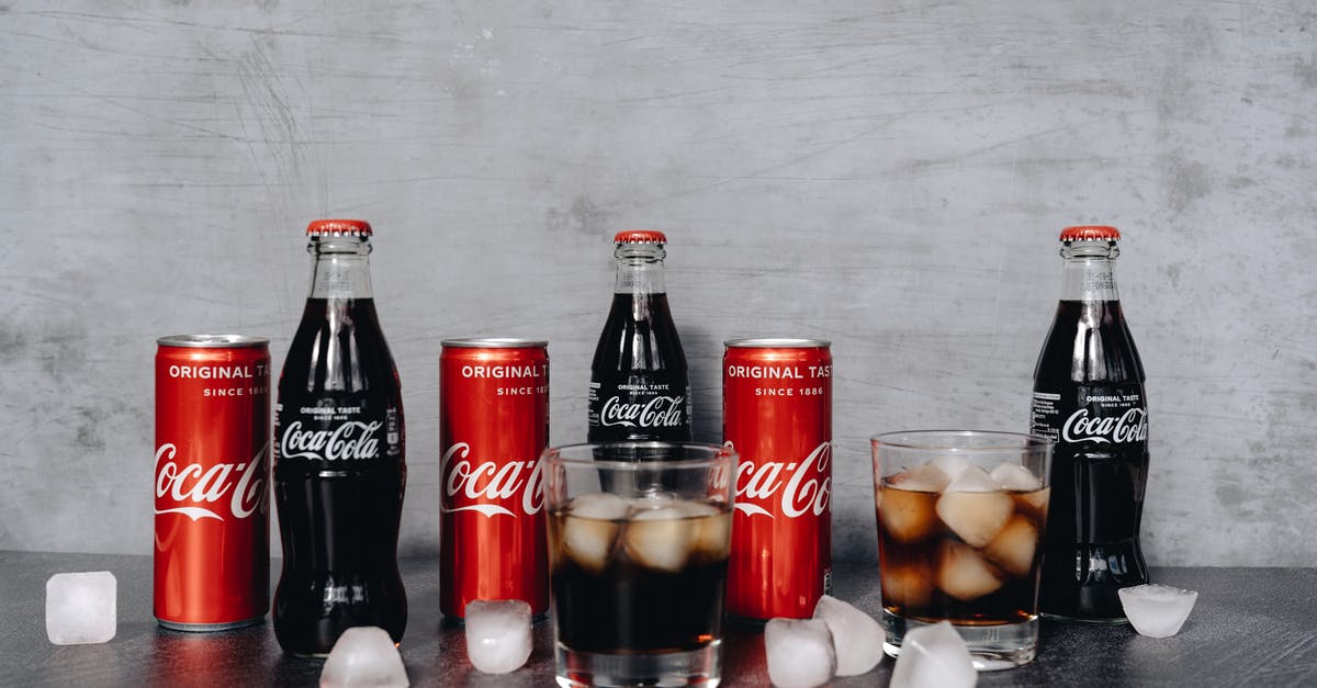 How to keep drinks carbonated - Photo Of Bottled Soft Drinks Beside Glasses How to keep drinks carbonated - Photo Of Bottled Soft Drinks Beside Glasses