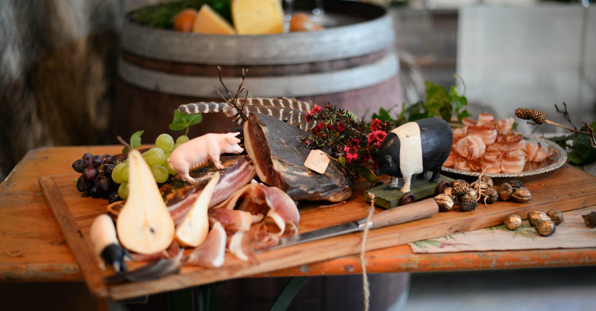 How to keep flies away from curing meat - Delicious meat appetizers with fruits on wooden desk How to keep flies away from curing meat - Delicious meat appetizers with fruits on wooden desk