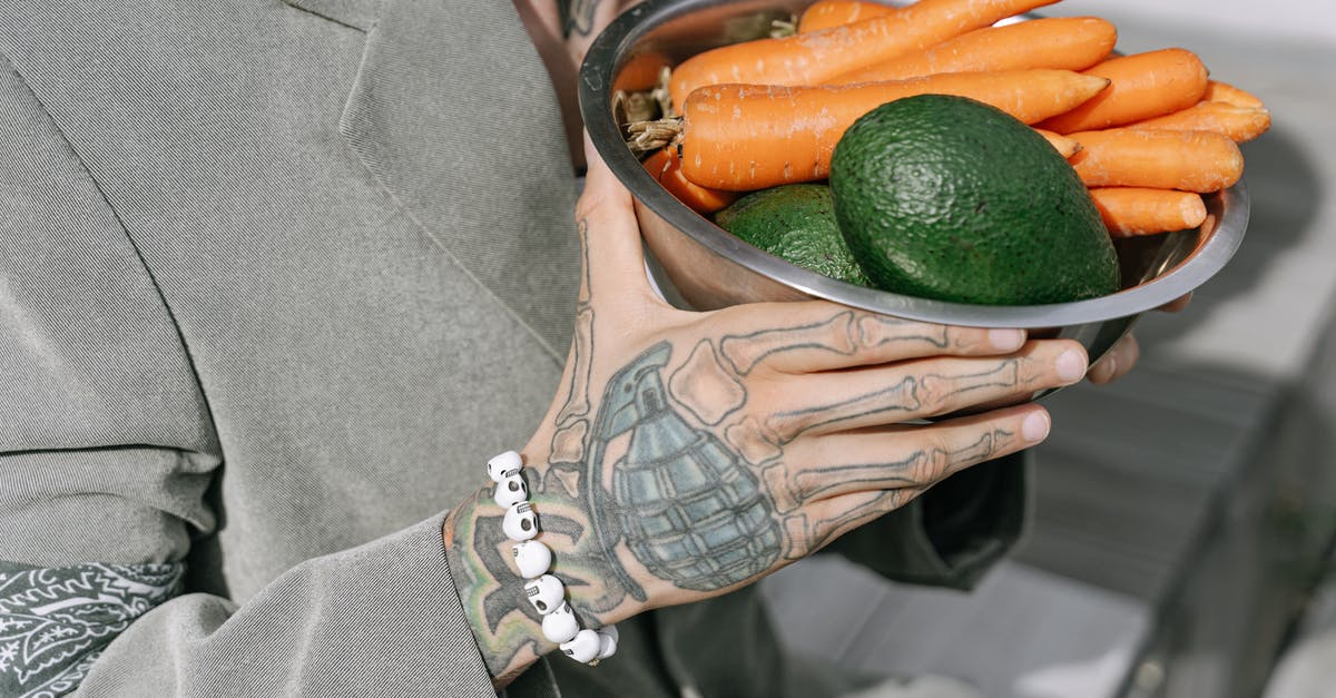 How to keep fruits and vegetables fresh - Person Holding Stainless Steel Bowl With Fruits